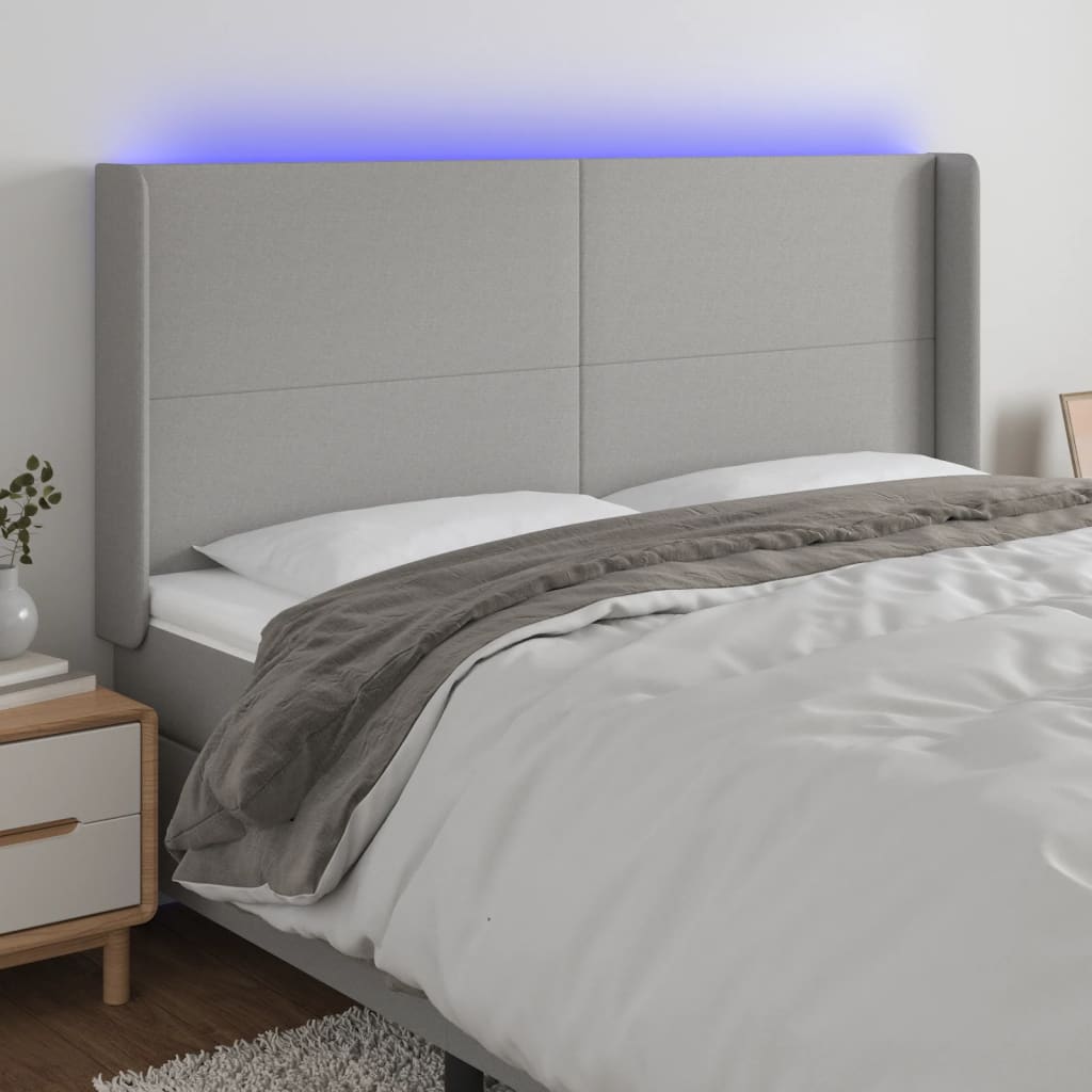 vidaXL Hoofdbord LED 83x16x78/88 cm stof lichtgrijs